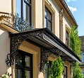 козырек кованый над окном