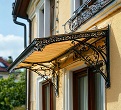 козырек с ковкой маркиза окно