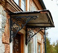 козырек кованый над крыльцом из металла