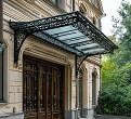 козырек кованый над входом из металла
